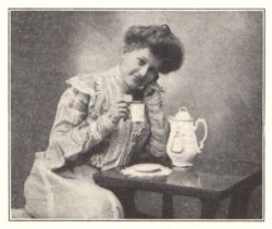 Lady drinking cocoa.