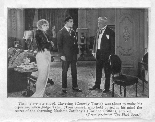 Their tete-e-tete ended, Clavering (Conway Tearle) was about to make his departure when Judge Trent (Tom Guise), who held buried in his mind the secret of the charming Madame Zattiany's (Corinne Griffith), entered.  (_Screen version of "The Black Oxen."_)