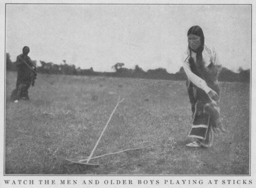 Watch the Men and Older Boys Playing at Sticks