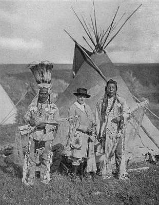 Pi-ta-mak-an, or Running Eagle (Mrs. Rinehart), with two other members of the Blackfoot Tribe