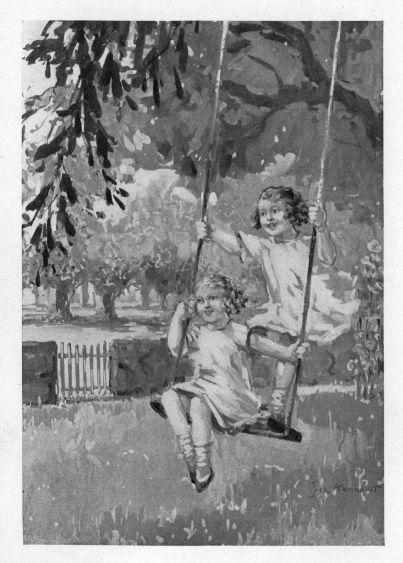 Two little girls on a swing.