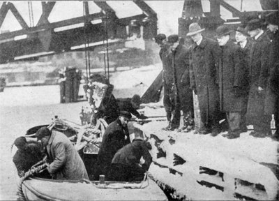 Mayor of Cleveland getting motor boats ready for relief work in Northern Ohio. For days after the flood reached its height, even strong boats could reach many of the marooned people only with great difficulty and risk