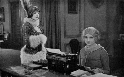 Alathea (Harriet Hammond) realizes that Suzette (Renee Adoree) is the only woman that stands between her and the love of Sir Nicholas (Lew Cody). (A scene from Elinor Glyn's production "Man and Maid" for Metro-Goldwyn-Mayer)