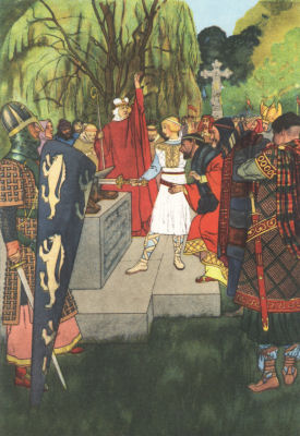 Arthur pulls the sword Excalibur from the stone as a group of knights
look on.