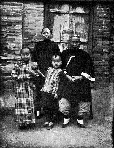 LING AI, HER CHILDREN, AND HER MOTHER, MRS. LIANG. To face page 252.