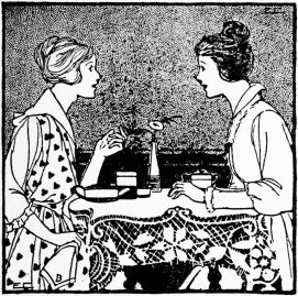Two women chatting at a table