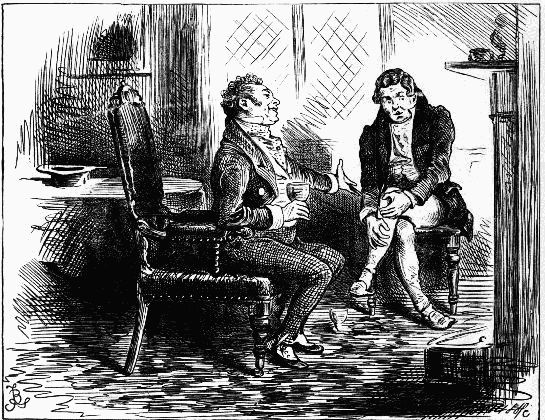 two men seated chatting