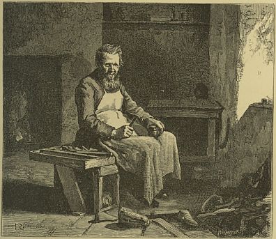 man sitting in workshop