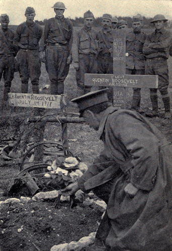 Colonel Barker placing the
commander’s flowers on Lieutenant Quentin Roosevelt’s grave