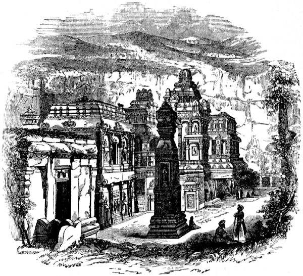 Showing a number of decorated buildings and a free-standing ornate column