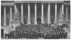 The United States Congress in wartime, including nearly
all the members of the House, on the steps of the Capitol
( Harris & Ewing)